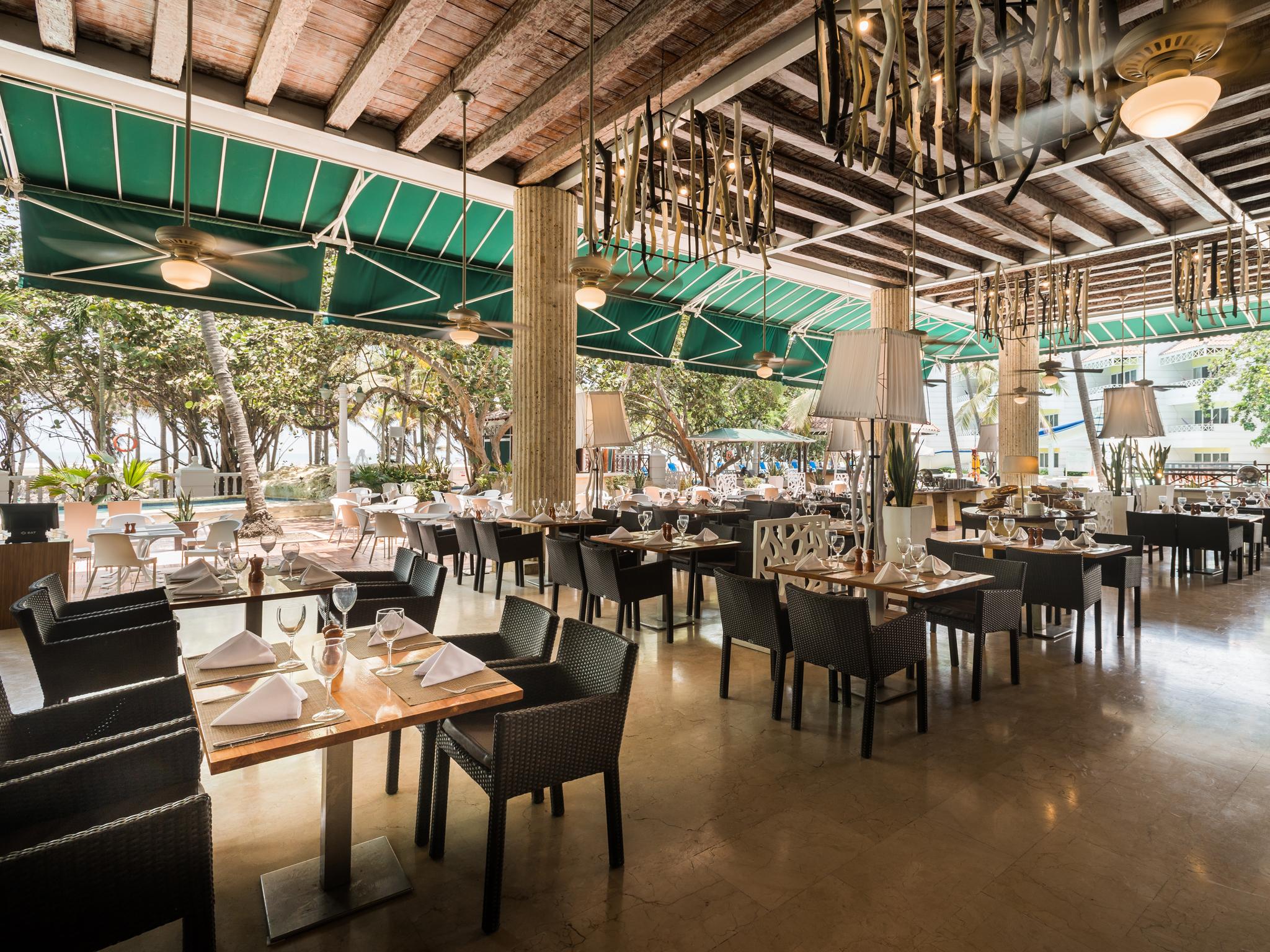 Hotel Las Americas Casa De Playa Cartagena Dış mekan fotoğraf The interior of the restaurant