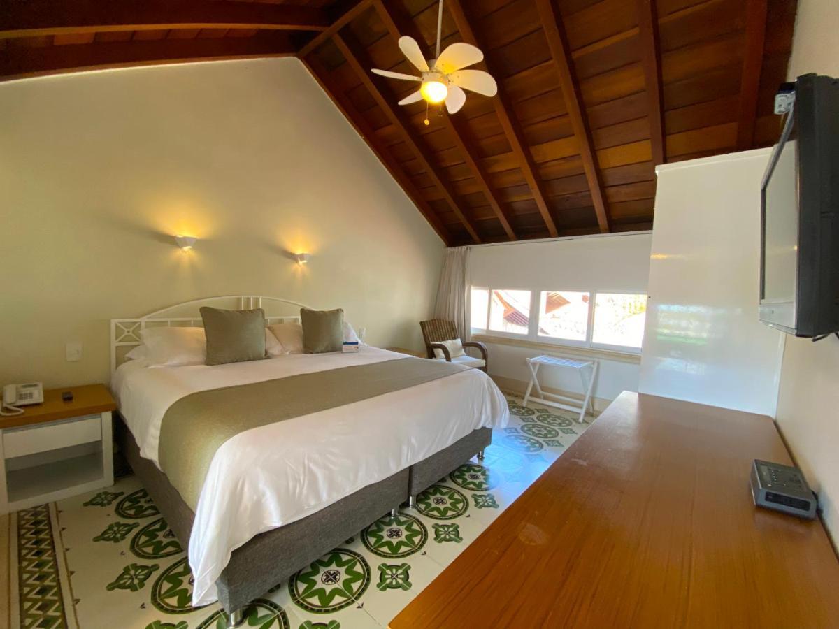Hotel Las Americas Casa De Playa Cartagena Dış mekan fotoğraf A room at the hotel