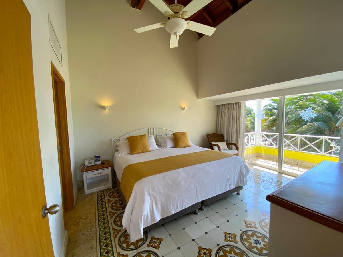 Hotel Las Americas Casa De Playa Cartagena Dış mekan fotoğraf A bedroom at the hotel