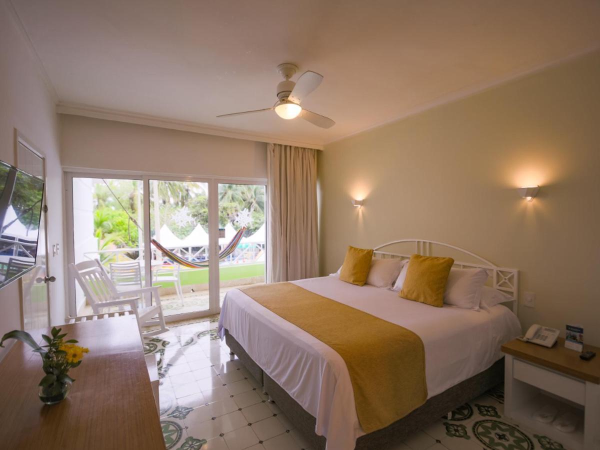 Hotel Las Americas Casa De Playa Cartagena Dış mekan fotoğraf A bedroom at the hotel